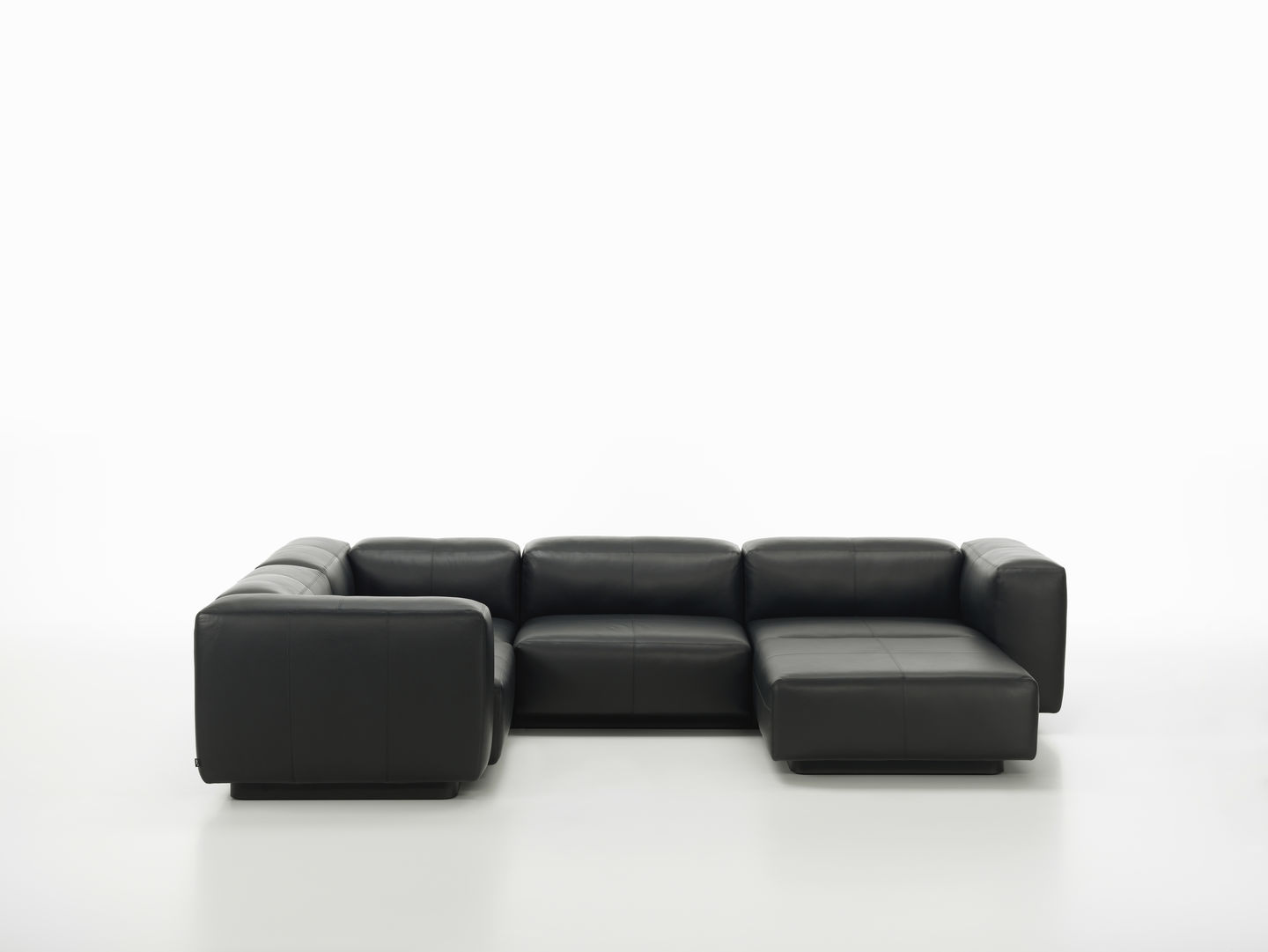 Black leather modular sectional sofa — product reference image for Gendo AI placement